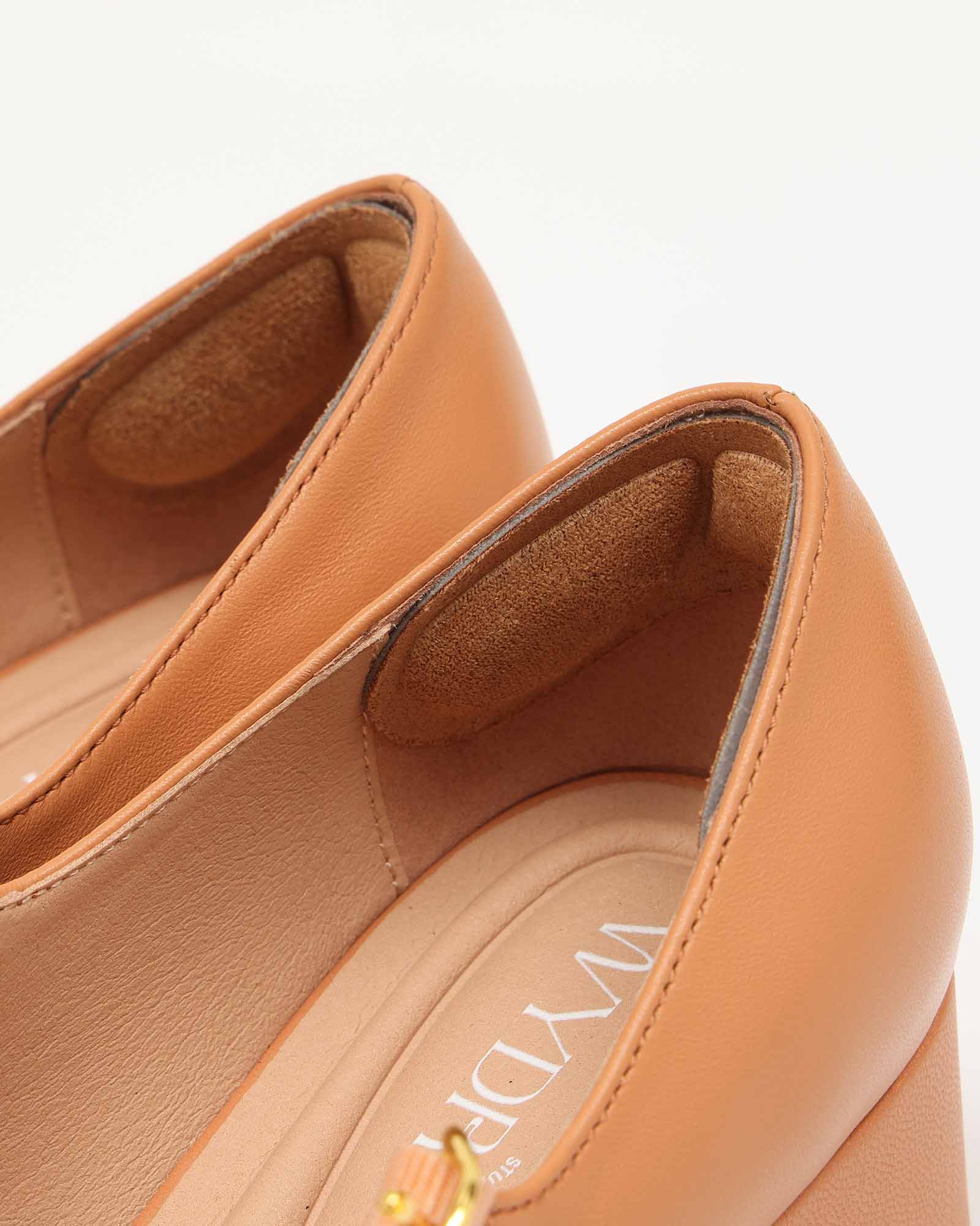 Tan leather shoes with wide cushioned insoles