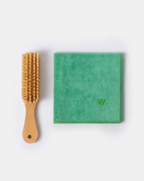 Green cloth and wooden brush